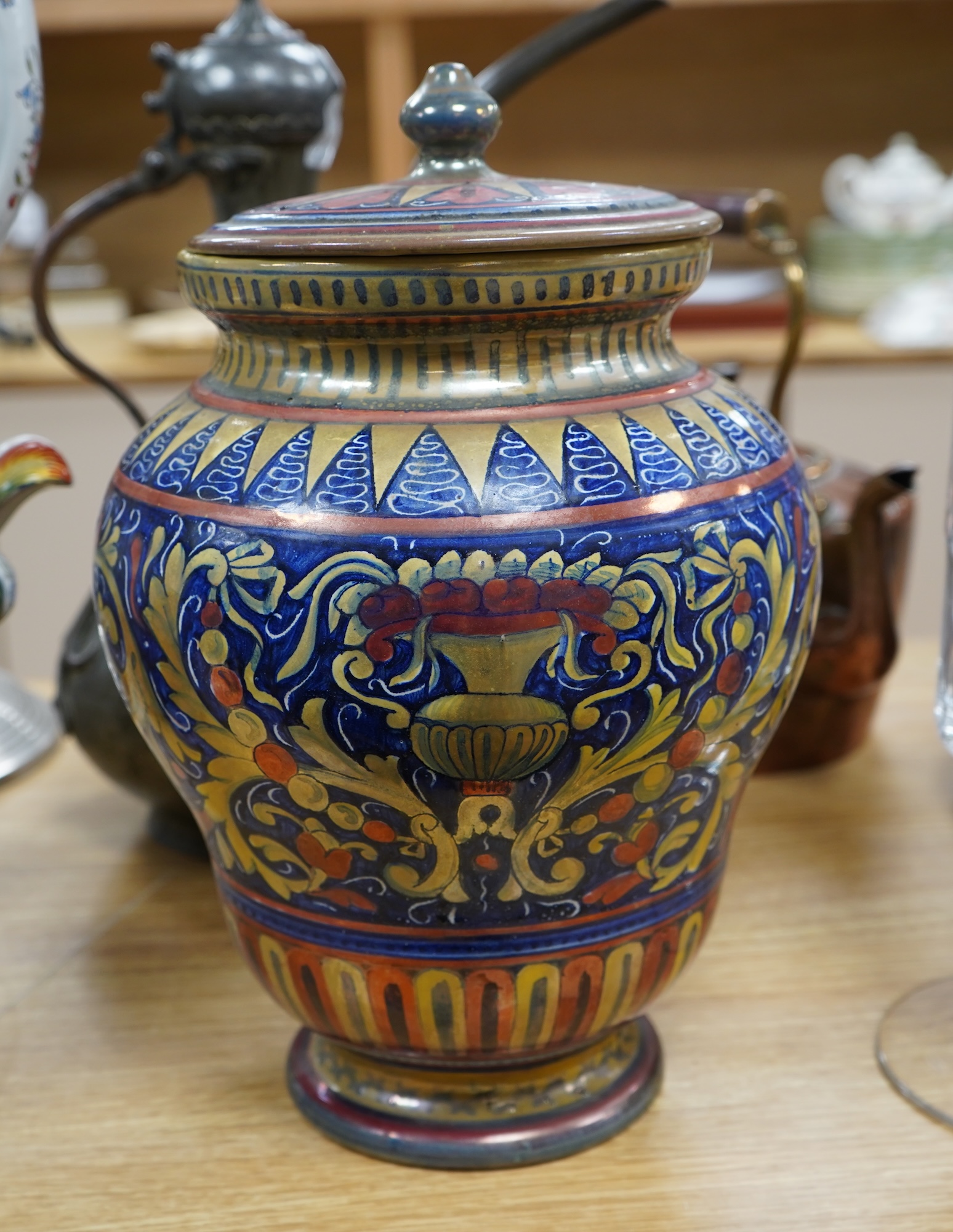 An Italian tin glazed pottery jar and cover, 30cm